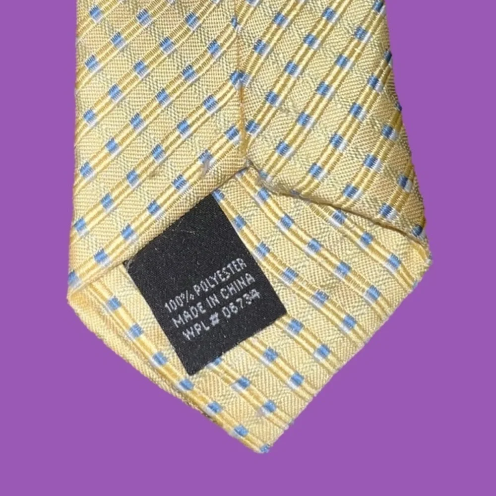 Little boy’s light yellow and baby blue tie great for Spring